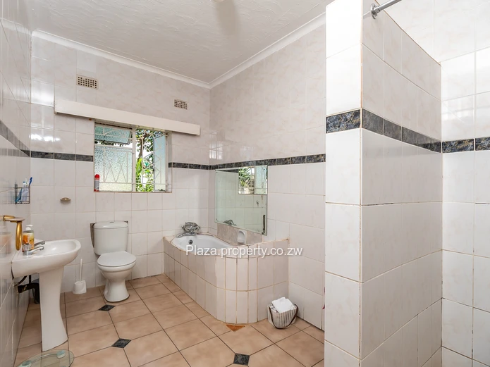 Strategically Located 4-Bedroom Family Home with Cottage – Sunridge, Harare Drive Frontage