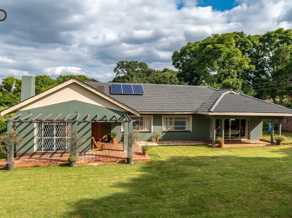 Elegant 4-Bedroom Home with Prolific Borehole & Solar back up power system in Prestigious Kennedy Dr