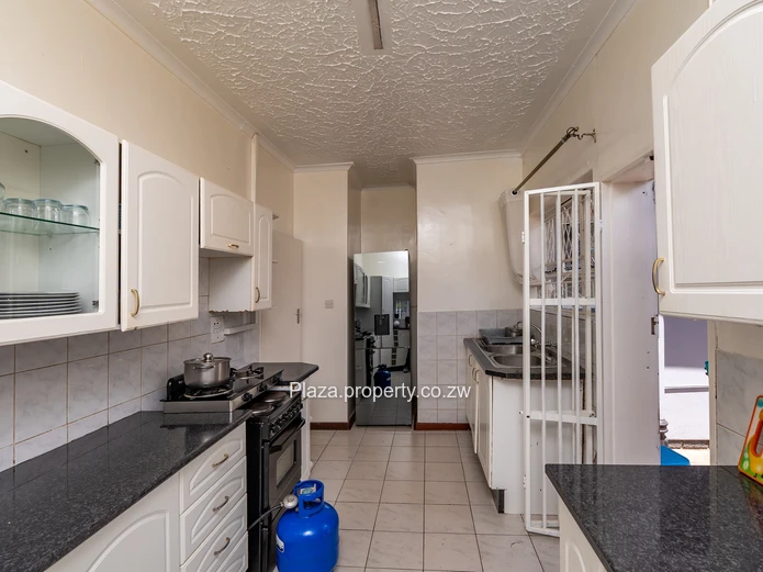 Strategically Located 4-Bedroom Family Home with Cottage – Sunridge, Harare Drive Frontage