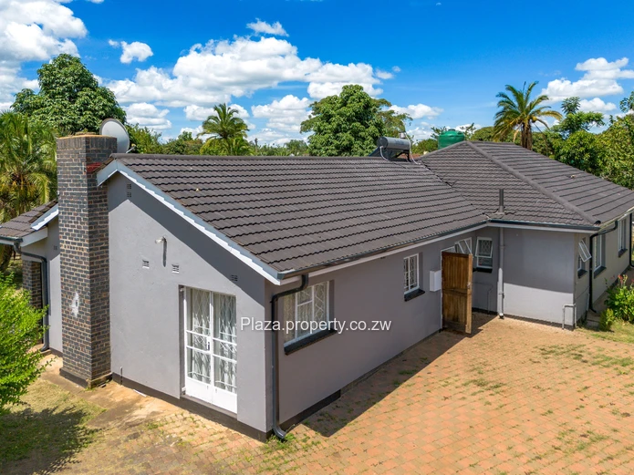 Strategically Located 4-Bedroom Family Home with Cottage – Sunridge, Harare Drive Frontage
