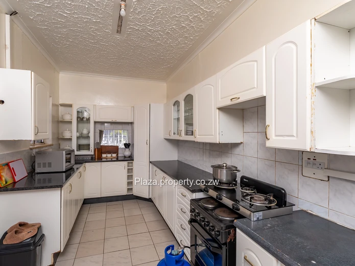 Strategically Located 4-Bedroom Family Home with Cottage – Sunridge, Harare Drive Frontage
